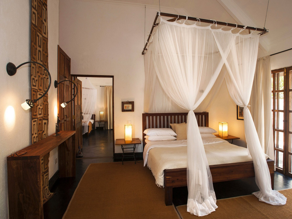 The Plantation Lodge, Karatu — Canopy bedroom